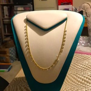 Gold over sterling silver necklace adjustable.